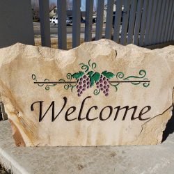Natural Carved Stone Welcome Sign with Grapes and Vine design