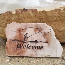 Engraved Stone Welcome Sign with fly-fisherman character