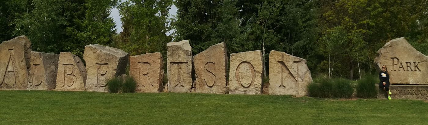 Albertson Park sign by pinnacle stone